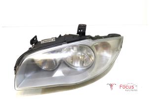 Gebruikte Koplamp links BMW 1 serie (E87/87N) 118d 16V Prijs € 75,00 Margeregeling aangeboden door Focus Automotive