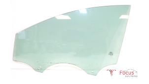 Gebruikte Deurruit 4Deurs links-voor Ford Focus 3 1.0 Ti-VCT EcoBoost 12V 125 Prijs € 37,50 Margeregeling aangeboden door Focus Automotive