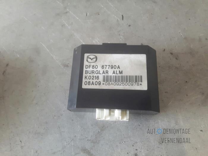 Alarm module Mazda 2.