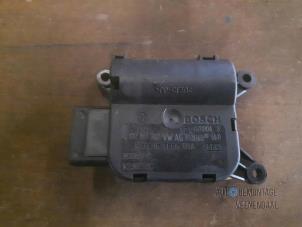 Gebruikte Kachelklep Motor Volkswagen Golf V (1K1) 1.6 FSI 16V Prijs € 10,00 Margeregeling aangeboden door Autodeleninkleur