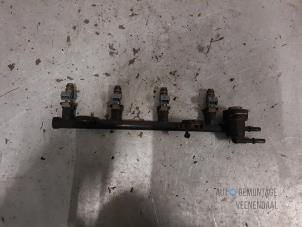 Gebruikte Injector brug Ford Fiesta 5 (JD/JH) 1.3 Prijs € 14,00 Margeregeling aangeboden door Autodeleninkleur