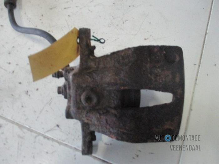 Front brake calliper, left - ef606abd-3742-4cb3-a262-b422b14e24ae.jpg