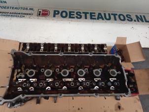 Gebruikte Cilinderkop BMW 5 serie (E39) 520i 24V Prijs € 300,00 Margeregeling aangeboden door Autodemontagebedrijf R. Poeste B.V.