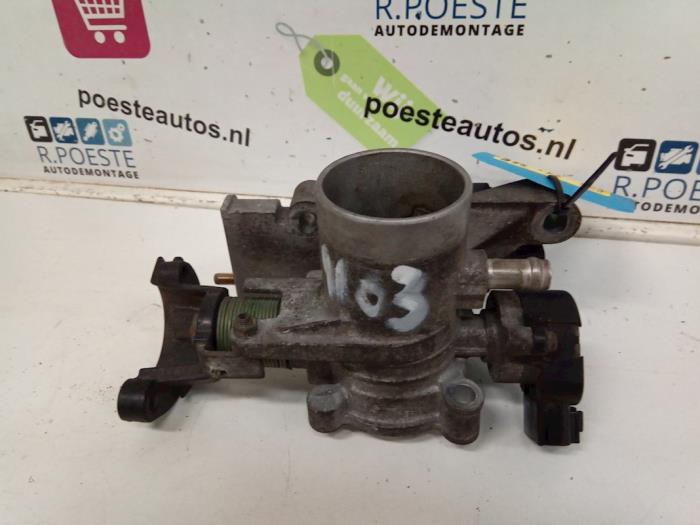 Gasklephuis van een Daihatsu Cuore (L251/271/276) 1.0 12V DVVT 2004