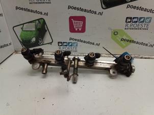 Gebruikte Injector brug BMW 3 serie (E36/2C) 318i Prijs € 40,00 Margeregeling aangeboden door Autodemontagebedrijf R. Poeste B.V.