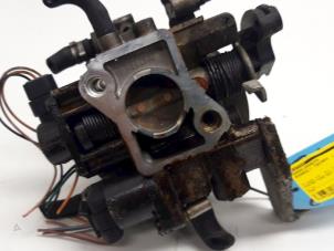 Gebruikte Gasklephuis Renault Twingo (C06) 1.2 SPi Phase I Prijs € 30,00 Margeregeling aangeboden door Autodemontagebedrijf R. Poeste B.V.