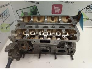 Gebruikte Cilinderkop Opel Corsa C (F08/68) 1.0 12V Prijs € 150,00 Margeregeling aangeboden door Autodemontagebedrijf R. Poeste B.V.