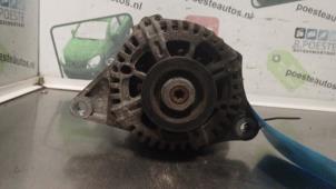 Gebruikte Dynamo Nissan Micra (K12) 1.2 16V Prijs € 30,00 Margeregeling aangeboden door Autodemontagebedrijf R. Poeste B.V.