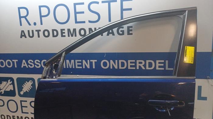 Portier 4Deurs links-voor van een Volkswagen Polo IV (9N1/2/3) 1.4 16V 2007