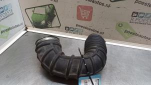 Gebruikte Luchtinlaat slang Ford Fiesta 5 (JD/JH) 1.3 Prijs € 20,00 Margeregeling aangeboden door Autodemontagebedrijf R. Poeste B.V.