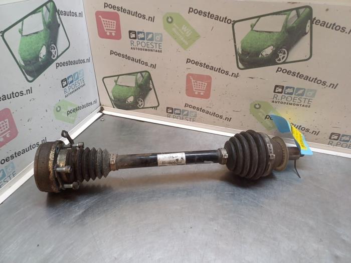 Homokineetas links-voor van een Volkswagen Polo V (6R) 1.2 12V BlueMotion Technology 2012