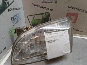 Gebruikte Koplamp links Toyota Starlet (EP9) 1.3 12V Prijs € 30,00 Margeregeling aangeboden door Autodemontagebedrijf R. Poeste B.V.