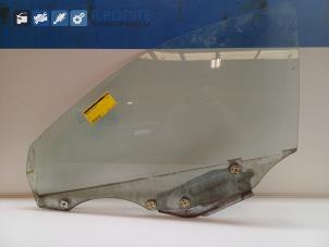 Gebruikte Deurruit 2Deurs links Mazda 323 F (BA14) 1.5i GLX,GT 16V Prijs € 30,00 Margeregeling aangeboden door Autodemontagebedrijf R. Poeste B.V.