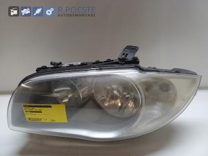Gebruikte Koplamp links BMW 1 serie (E87/87N) 116i 1.6 16V Prijs € 75,00 Margeregeling aangeboden door Autodemontagebedrijf R. Poeste B.V.