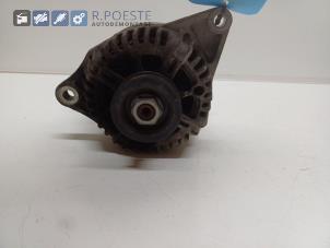 Gebruikte Dynamo Nissan Micra (K12) 1.4 16V Prijs € 30,00 Margeregeling aangeboden door Autodemontagebedrijf R. Poeste B.V.