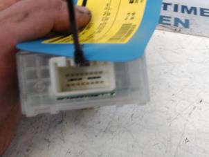 Central electronic module van een Mazda 626 (GW19) 2.0i 16V HiPower 2001