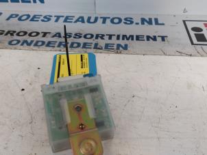 Central electronic module van een Mazda 626 (GW19) 2.0i 16V HiPower 2001