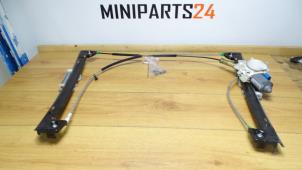 Gebruikte Ruitmechaniek 2Deurs links-voor Mini Mini Cooper S (R53) 1.6 16V Prijs € 107,10 Inclusief btw aangeboden door Miniparts24 - Miniteile24 GbR