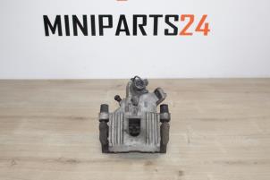 Gebruikte Remzadel links-achter Mini Mini Cooper S (R53) 1.6 16V Prijs € 53,55 Inclusief btw aangeboden door Miniparts24 - Miniteile24 GbR