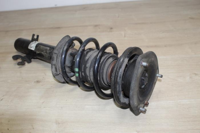 Schokdemper links-voor van een MINI Mini (R56) 1.6 16V Cooper 2006