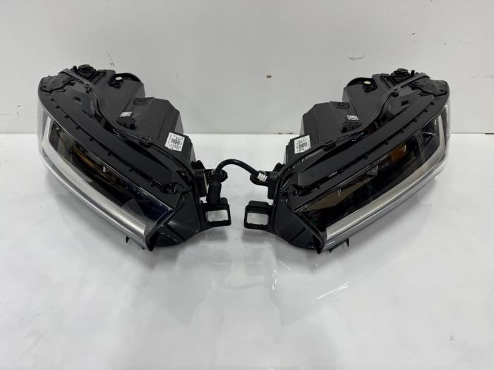 Koplampset links+rechts Skoda Superb