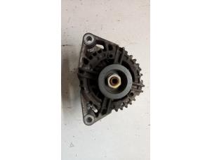 Gebruikte Dynamo Opel Corsa D 1.2 16V Prijs € 25,00 Margeregeling aangeboden door Hans Auto Onderdelen