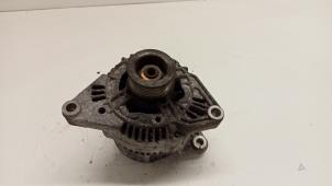 Gebruikte Dynamo Nissan Micra (K11) 1.3 LX,SLX 16V Prijs € 30,00 Margeregeling aangeboden door Hans Auto Onderdelen