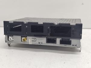 Gebruikte Radio module Audi A6 Avant (C6) 3.0 TDI V6 24V Quattro Prijs € 125,00 Margeregeling aangeboden door Hans Auto Onderdelen