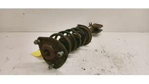 Gebruikte Mac Phersonpoot links-voor Mitsubishi Colt (Z2/Z3) 1.3 16V Prijs € 35,00 Margeregeling aangeboden door Hans Auto Onderdelen