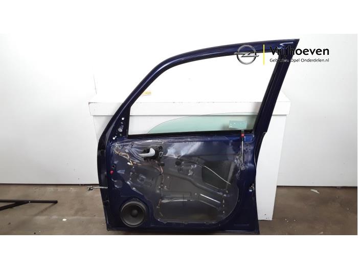 Portier 4Deurs rechts-voor van een Opel Meriva 1.8 16V 2004