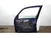 Portier 4Deurs rechts-voor van een Opel Meriva 1.8 16V 2004