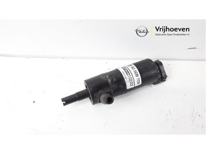 Pomp koplampsproeier van een Opel Zafira (M75) 1.8 16V Ecotec 2009