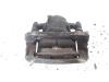 Remklauw (Tang) links-voor van een Opel Corsa C (F08/68) 1.2 16V Twin Port 2005