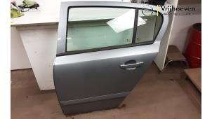 Gebruikte Deur 4Deurs links-achter Opel Astra H (L48) 1.4 16V Twinport Prijs € 50,00 Margeregeling aangeboden door Autodemontage Vrijhoeven B.V.