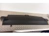 Dekzeil Bagageruimte van een Opel Astra H SW (L35) 1.8 16V 2005