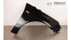 Gebruikte Scherm rechts-voor Opel Adam 1.4 16V Prijs € 200,00 Margeregeling aangeboden door Autodemontage Vrijhoeven B.V.