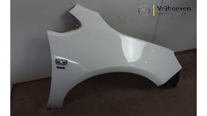 Gebruikte Scherm rechts-voor Opel Astra J GTC (PD2/PF2) 1.6 Turbo 16V Prijs € 125,00 Margeregeling aangeboden door Autodemontage Vrijhoeven B.V.