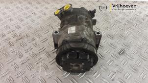Aircopomp van een Opel Corsa D 1.4 Turbo 16V 2013