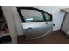 Portier 4Deurs rechts-voor van een Opel Meriva 1.4 16V Ecotec 2011