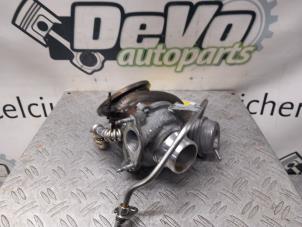 G-lader van een Ford Focus 4 1.0 EcoBoost 12V Hybrid 125 2021