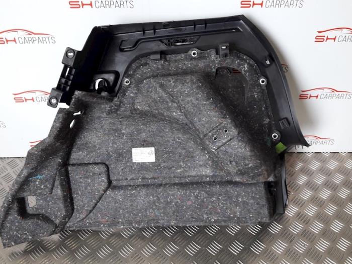 Kofferbakbekleding links van een Volkswagen Polo V (6R) 1.2 12V 2011