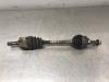 Aandrijfas links-voor van een Kia Rio (DC22/24) 1.5 16V 2004