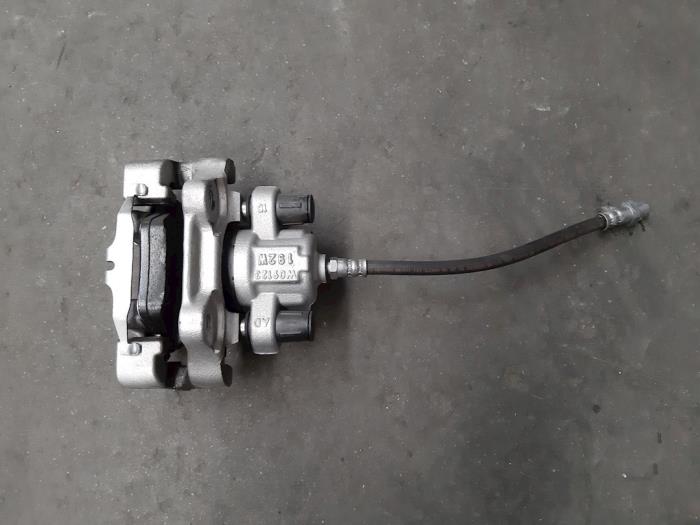 Rear brake calliperholder, left BMW 1-Serie