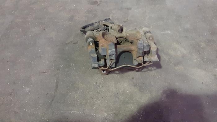 Rear brake calliperholder, left Audi A3