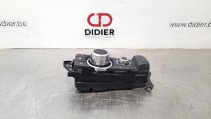 Gebruikte I-Drive knop Mazda 2 (DJ/DL) 1.5 SkyActiv-G 90 Prijs € 78,65 Inclusief btw aangeboden door Autohandel Didier