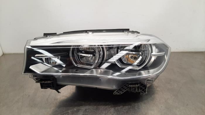 Headlight, left BMW X6