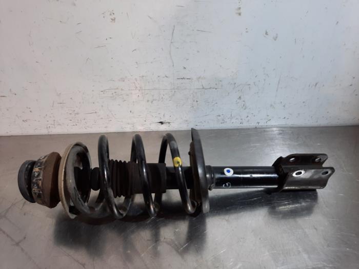 Fronts shock absorber, left Dacia Logan