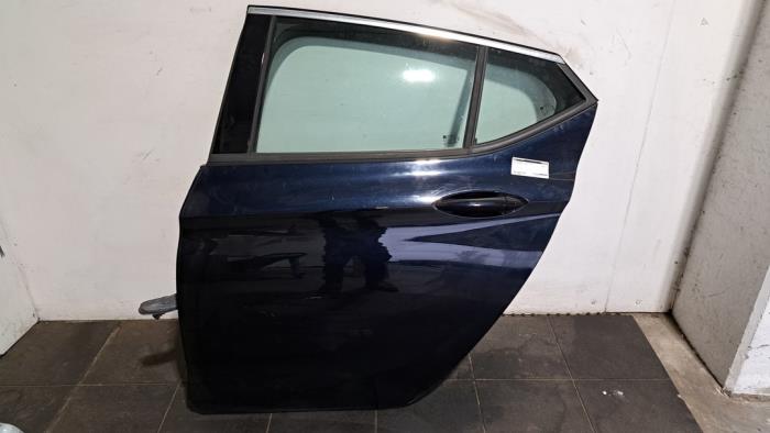 Drzwi lewe tylne wersja 4-drzwiowa Opel Astra
