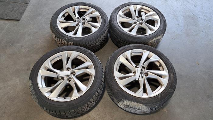 Set of wheels + tyres Opel Astra