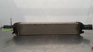 Intercooler van een Audi A6 Avant (C7) 3.0 TDI V6 24V 2013
